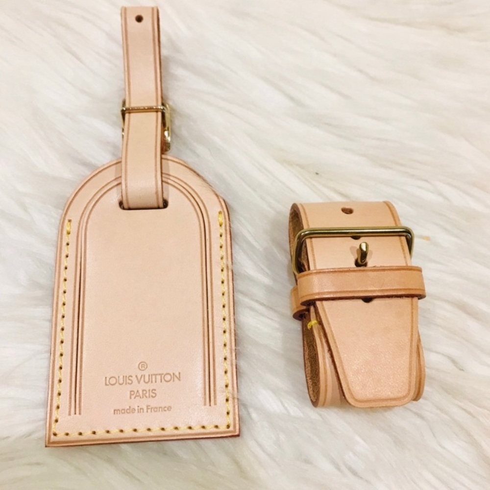 SOLD Louis Vuitton luggage tag